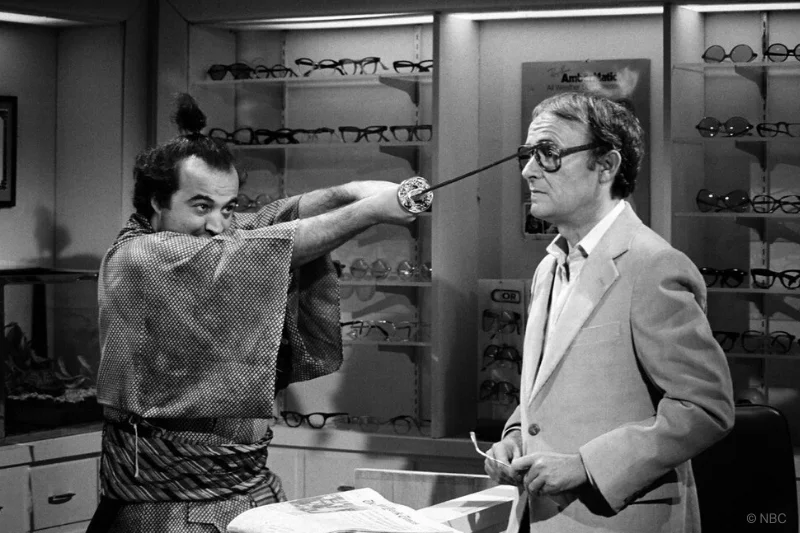 John Belushi and Buck Henry